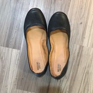 Black leather flats